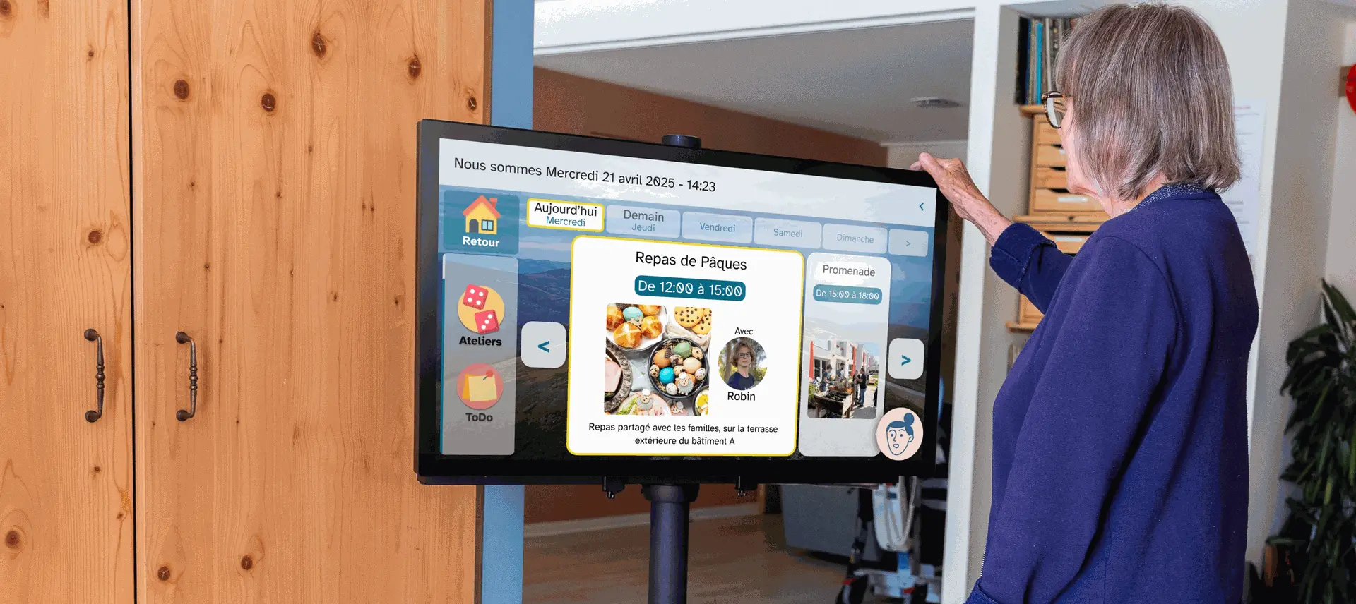 écran d'affichage interactif pour établissement qui affiche les animations pour les bénéficaires